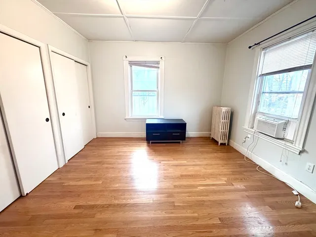a room with furniture and a window