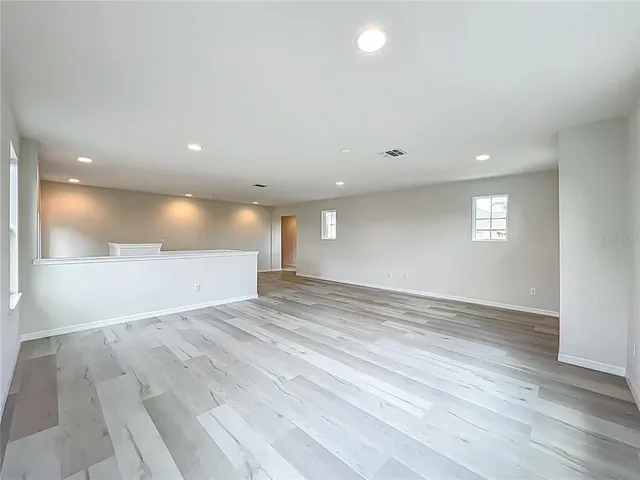 a bath tub sitting next to a shower