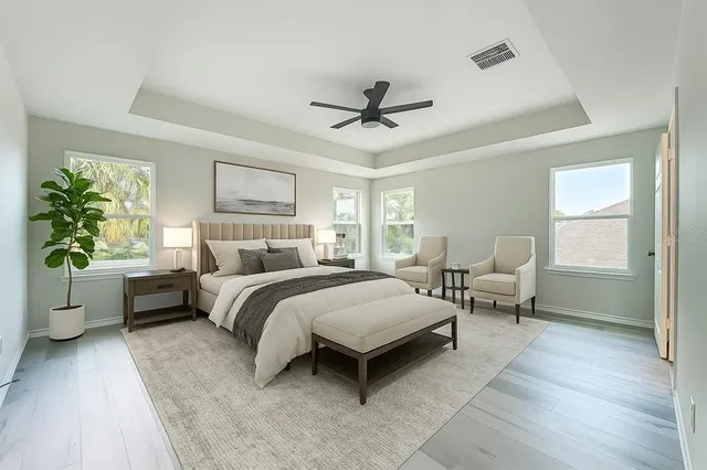 a view of a swimming pool with an outdoor space and seating area