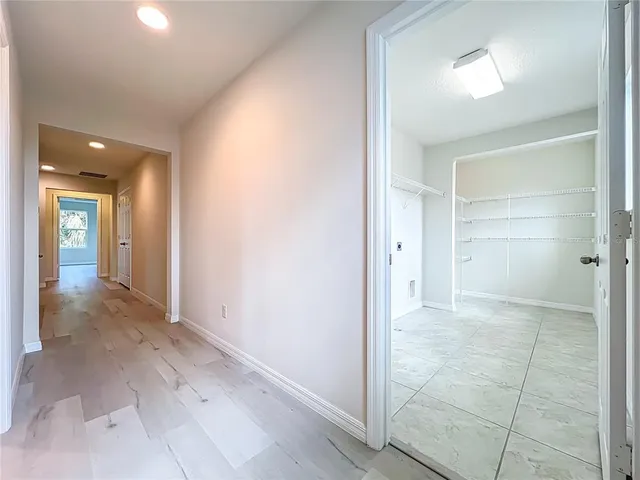 a view of a park with large trees