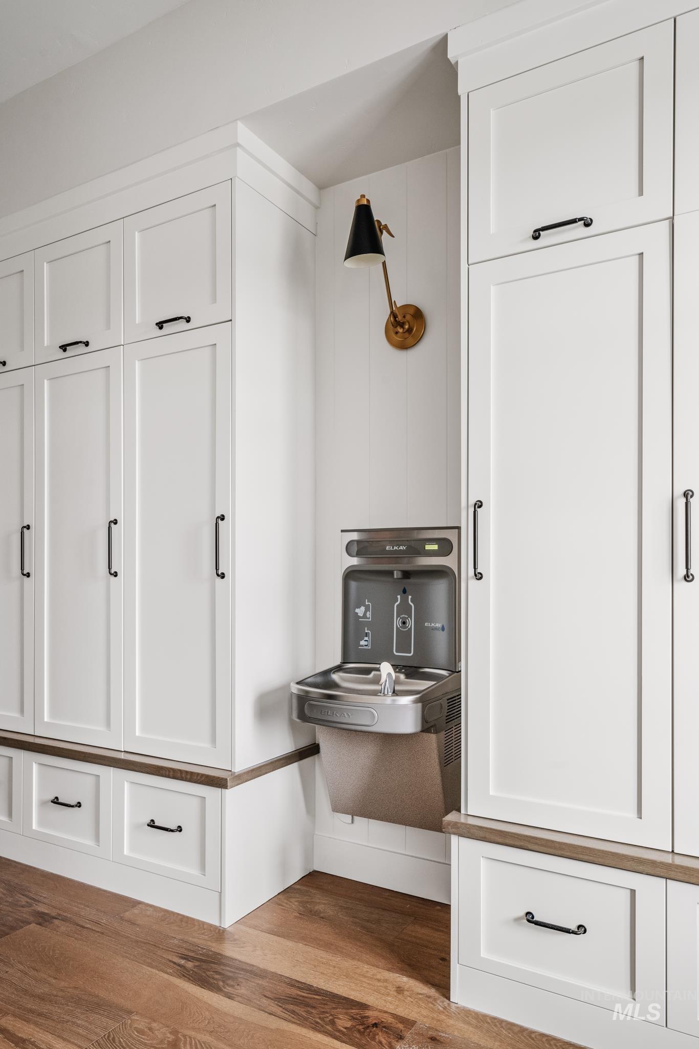 7448 North Cavea Lane Meridian, ID 83646 - Photo 13 of 40 Mudroom featuring dark wood-style floors