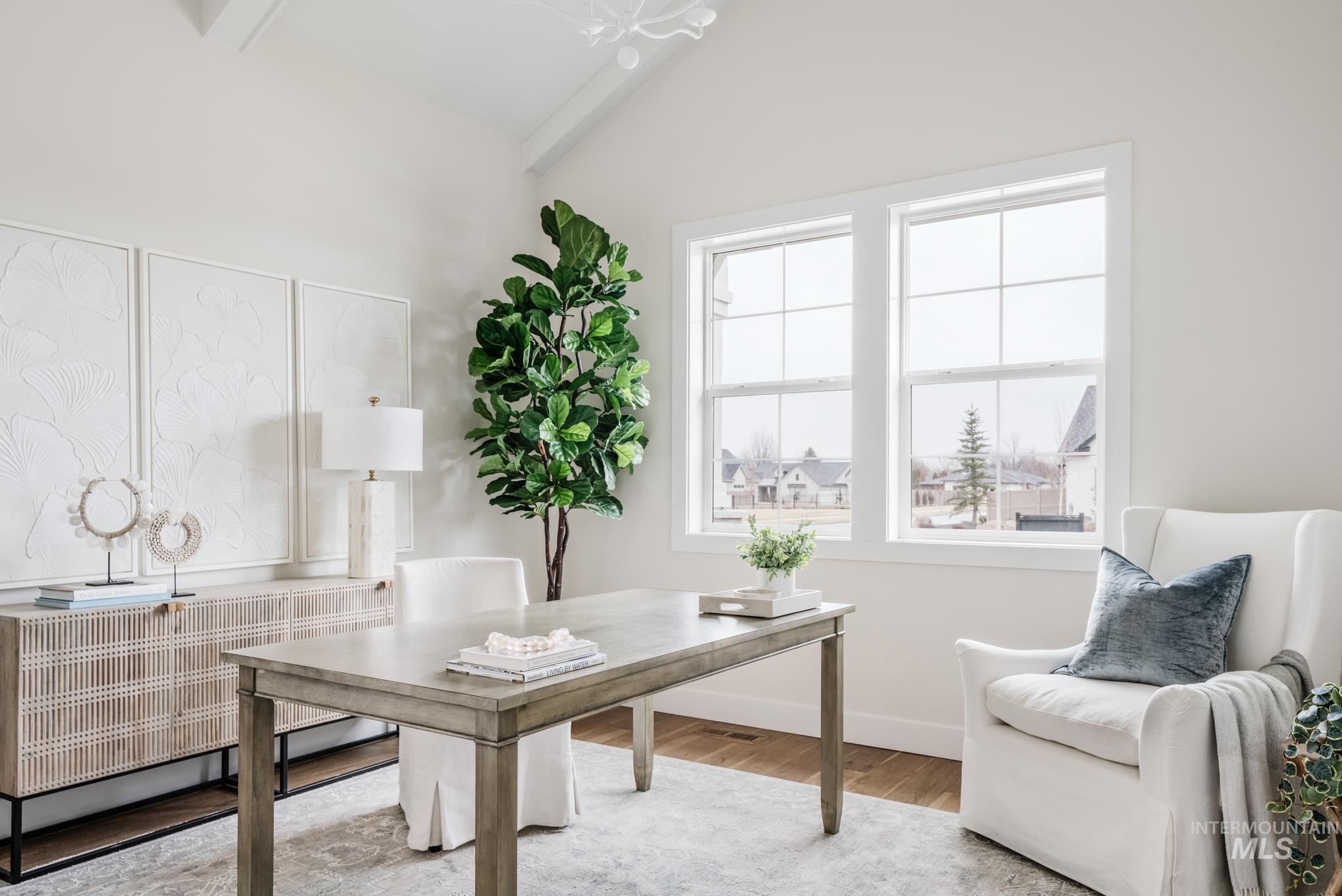 7448 North Cavea Lane Meridian, ID 83646 - Photo 21 of 40 Home office featuring wood finished floors and radiator