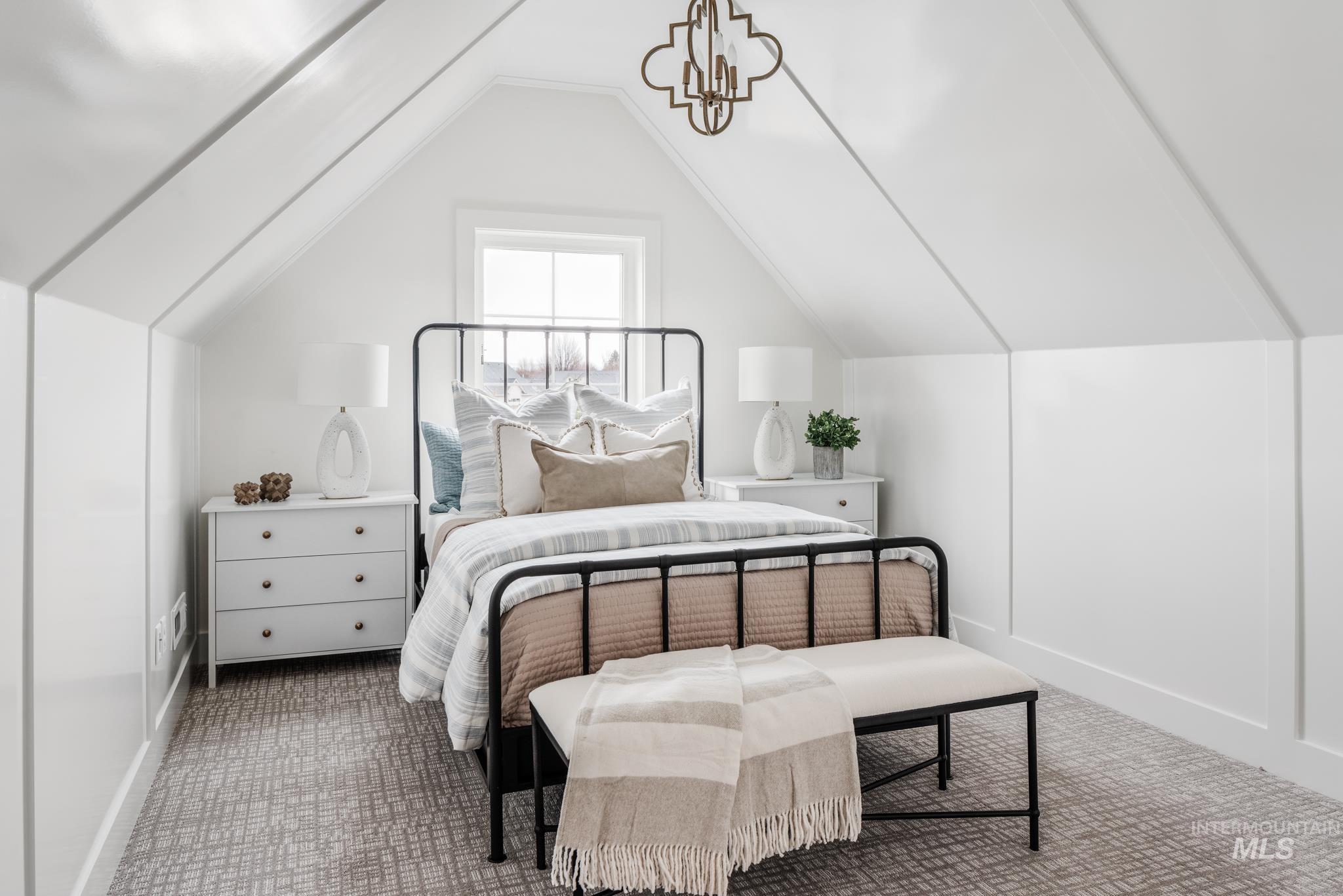 7448 North Cavea Lane Meridian, ID 83646 - Photo 26 of 40 Bedroom with carpet flooring and lofted ceiling