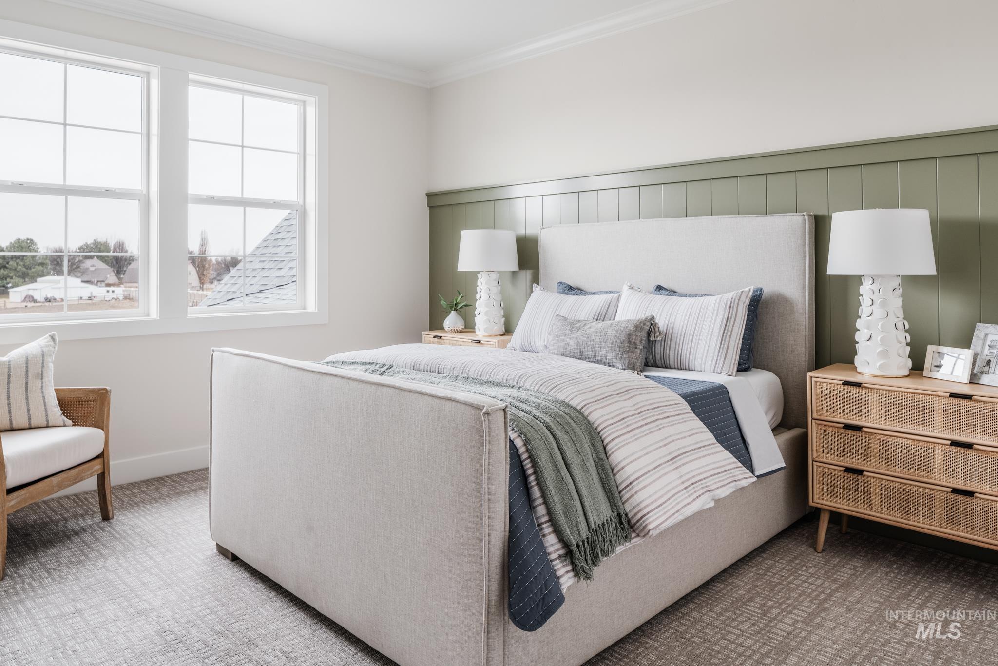 7448 North Cavea Lane Meridian, ID 83646 - Photo 29 of 40 Bedroom with ornamental molding and carpet