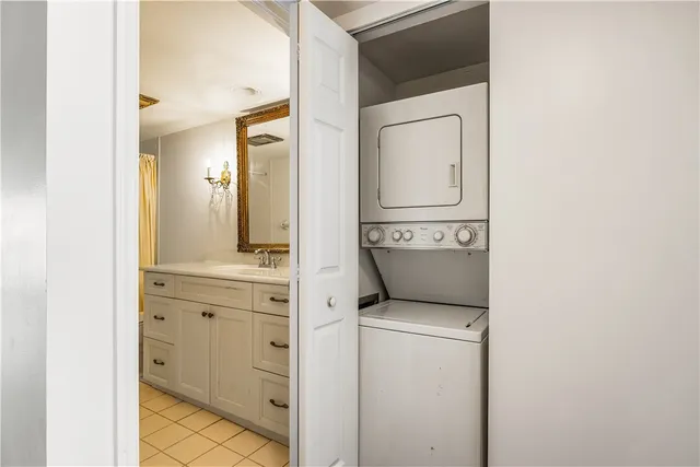 a view of a chairs and table in a backyard
