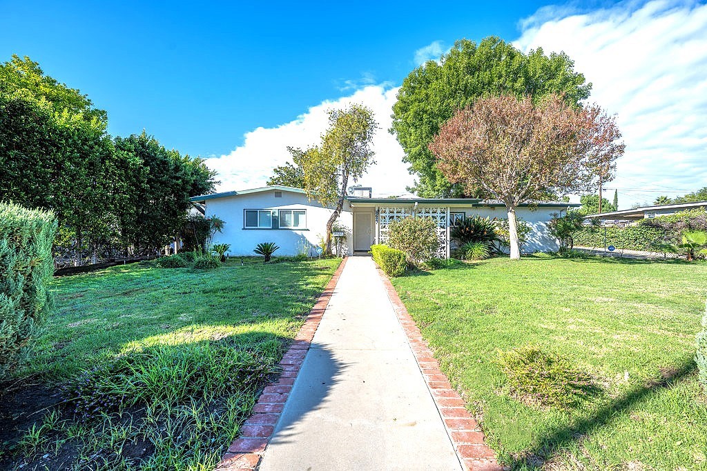 8621 Winnetka Avenue Winnetka, CA 91306 - Photo 2 of 25 a view of backyard with green space