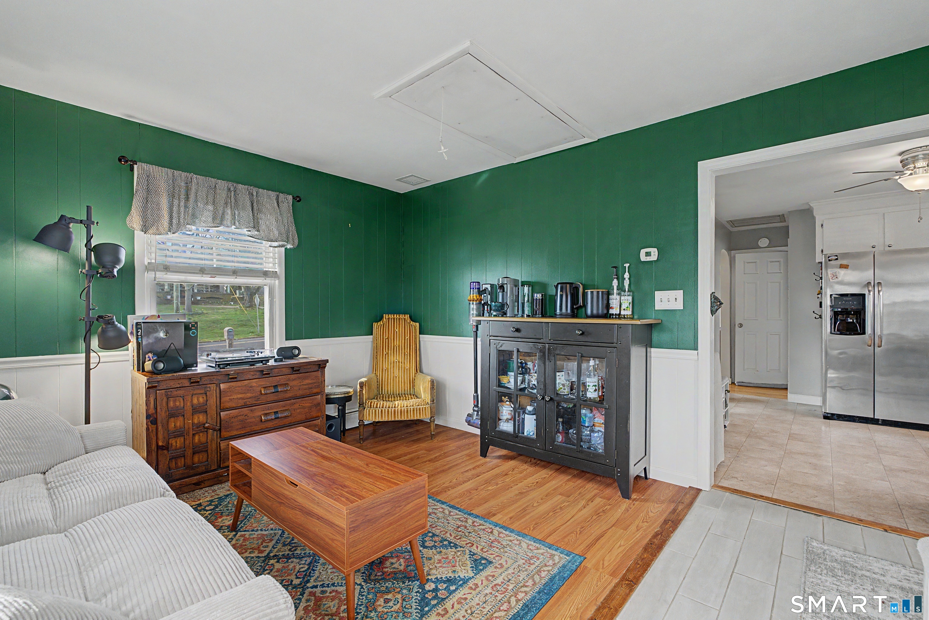 65 Jones Hill Road West Haven, CT 06516 - Photo 15 of 40 a living room with furniture and a fireplace