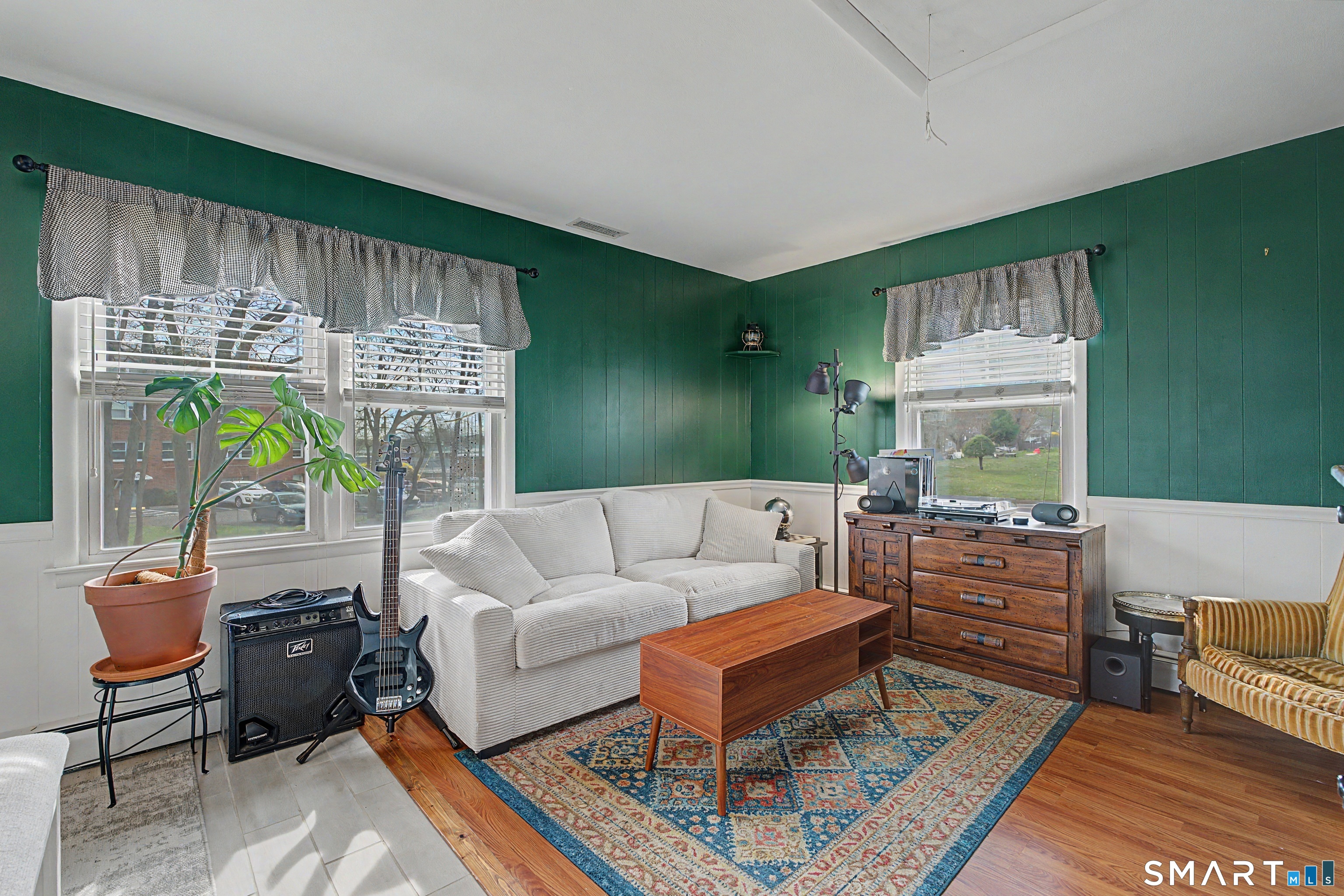65 Jones Hill Road West Haven, CT 06516 - Photo 16 of 40 a living room with furniture and a large window