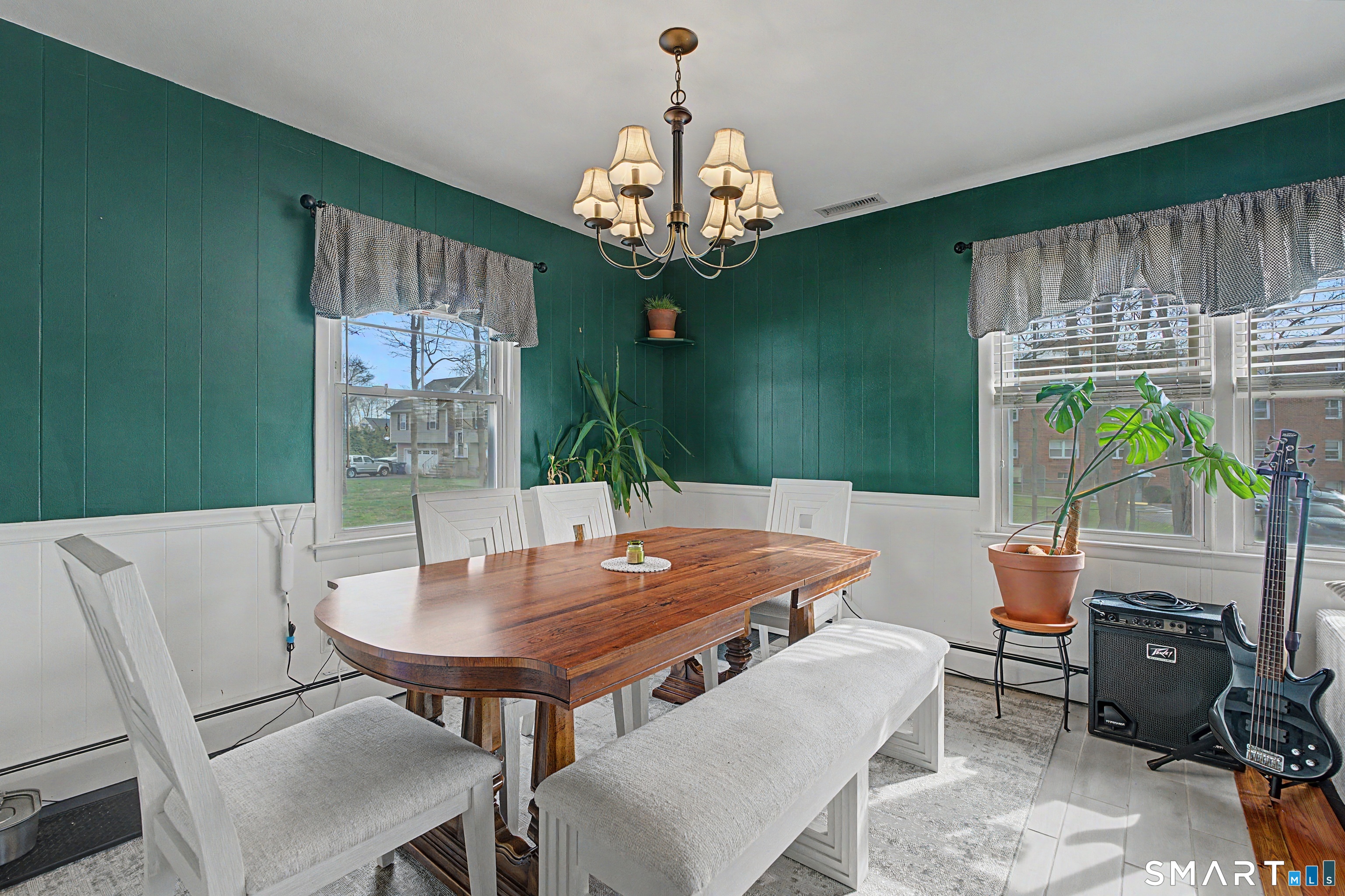 65 Jones Hill Road West Haven, CT 06516 - Photo 17 of 40 a view of a dining room with furniture window and outside view