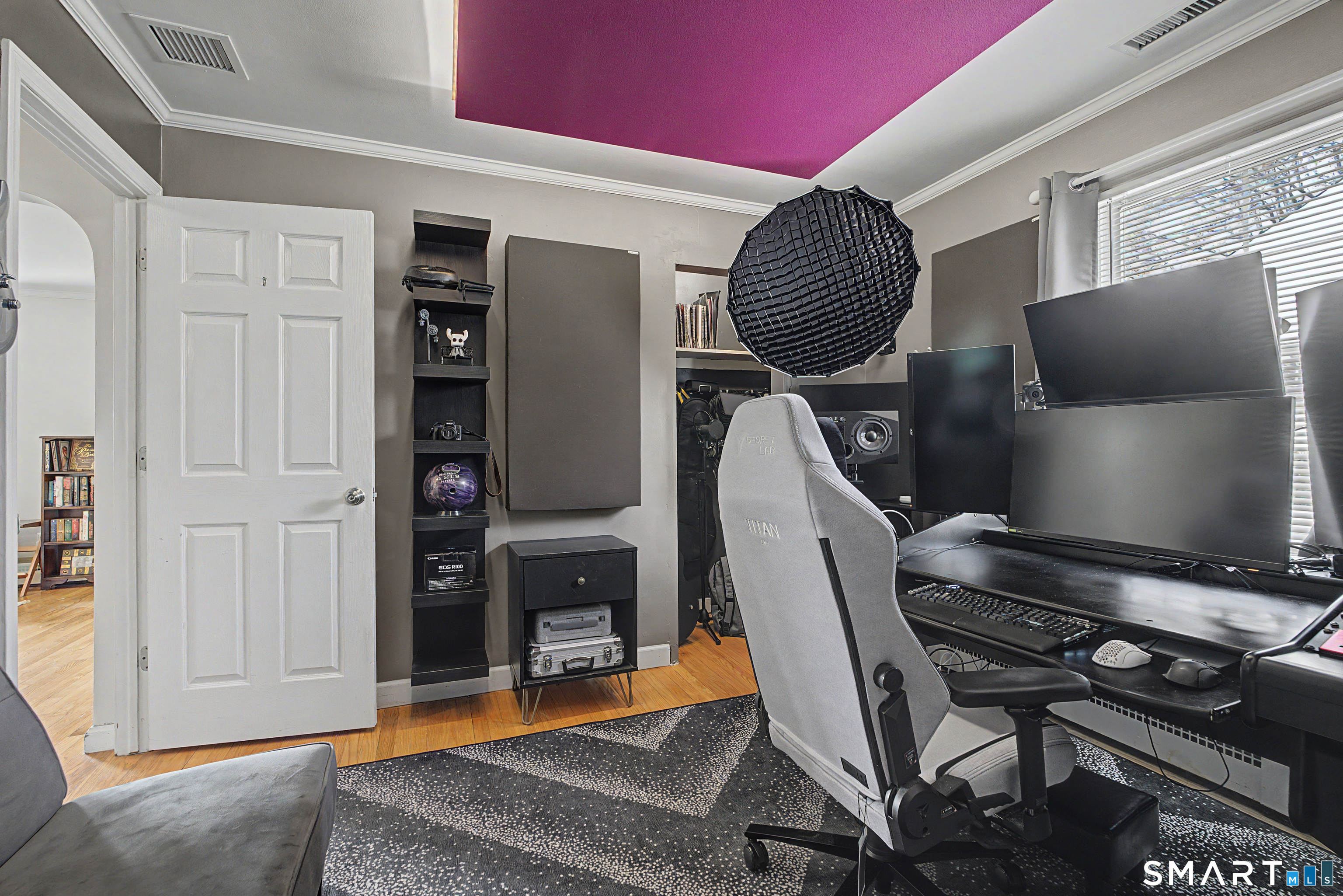 65 Jones Hill Road West Haven, CT 06516 - Photo 23 of 40 a living room with furniture and a flat screen tv