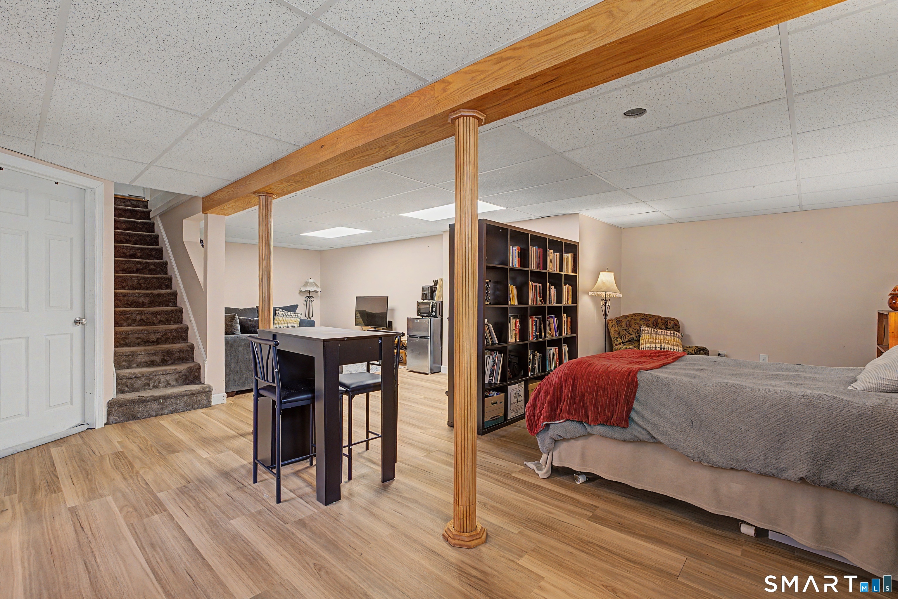 65 Jones Hill Road West Haven, CT 06516 - Photo 25 of 40 a bedroom with furniture and wooden floor