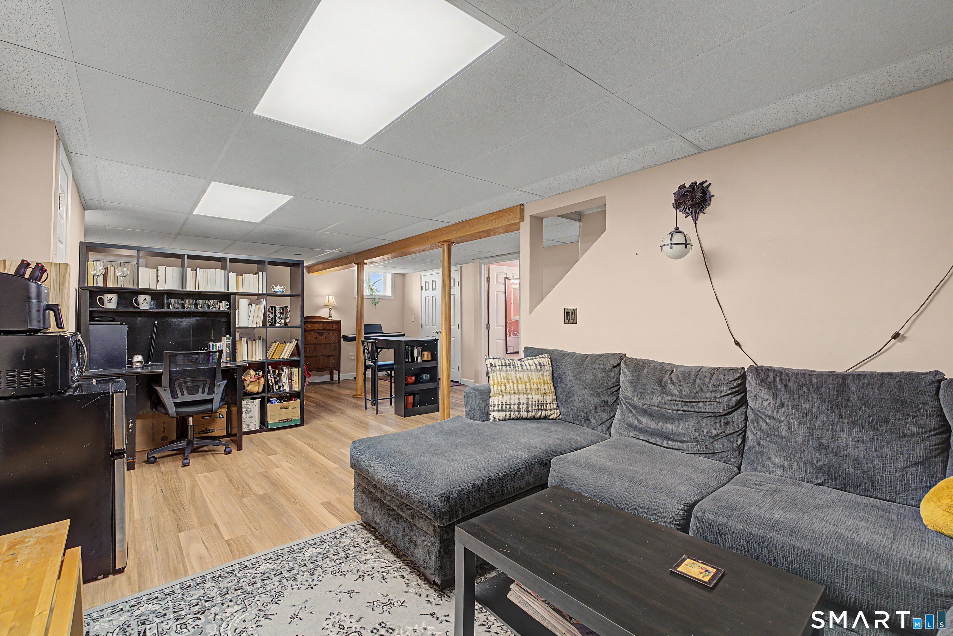 65 Jones Hill Road West Haven, CT 06516 - Photo 30 of 40 a living room with furniture and wooden floor