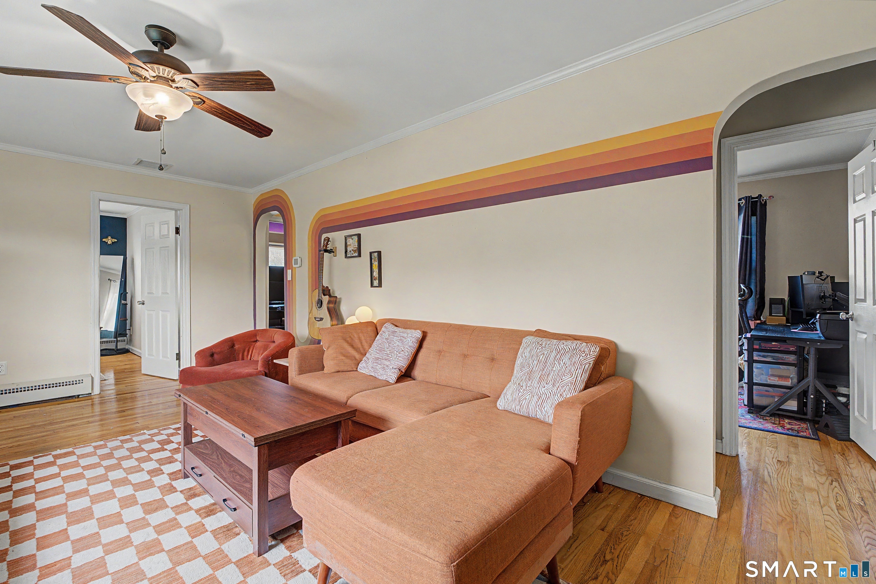 65 Jones Hill Road West Haven, CT 06516 - Photo 5 of 40 a living room with furniture and wooden floor