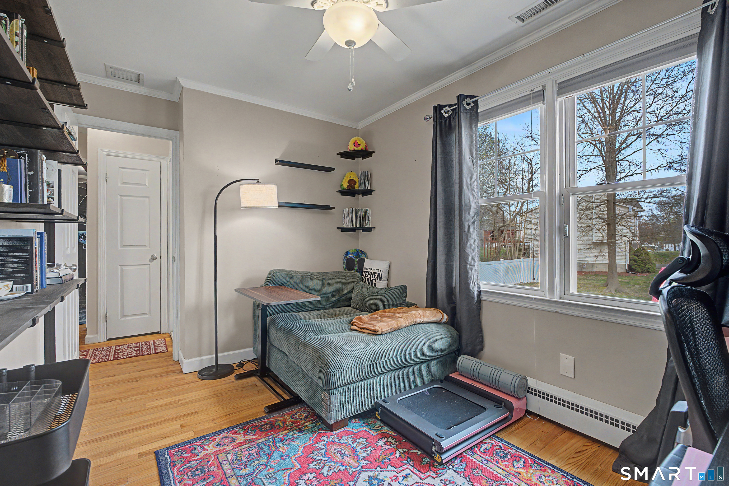 65 Jones Hill Road West Haven, CT 06516 - Photo 7 of 40 a living room with furniture and a window