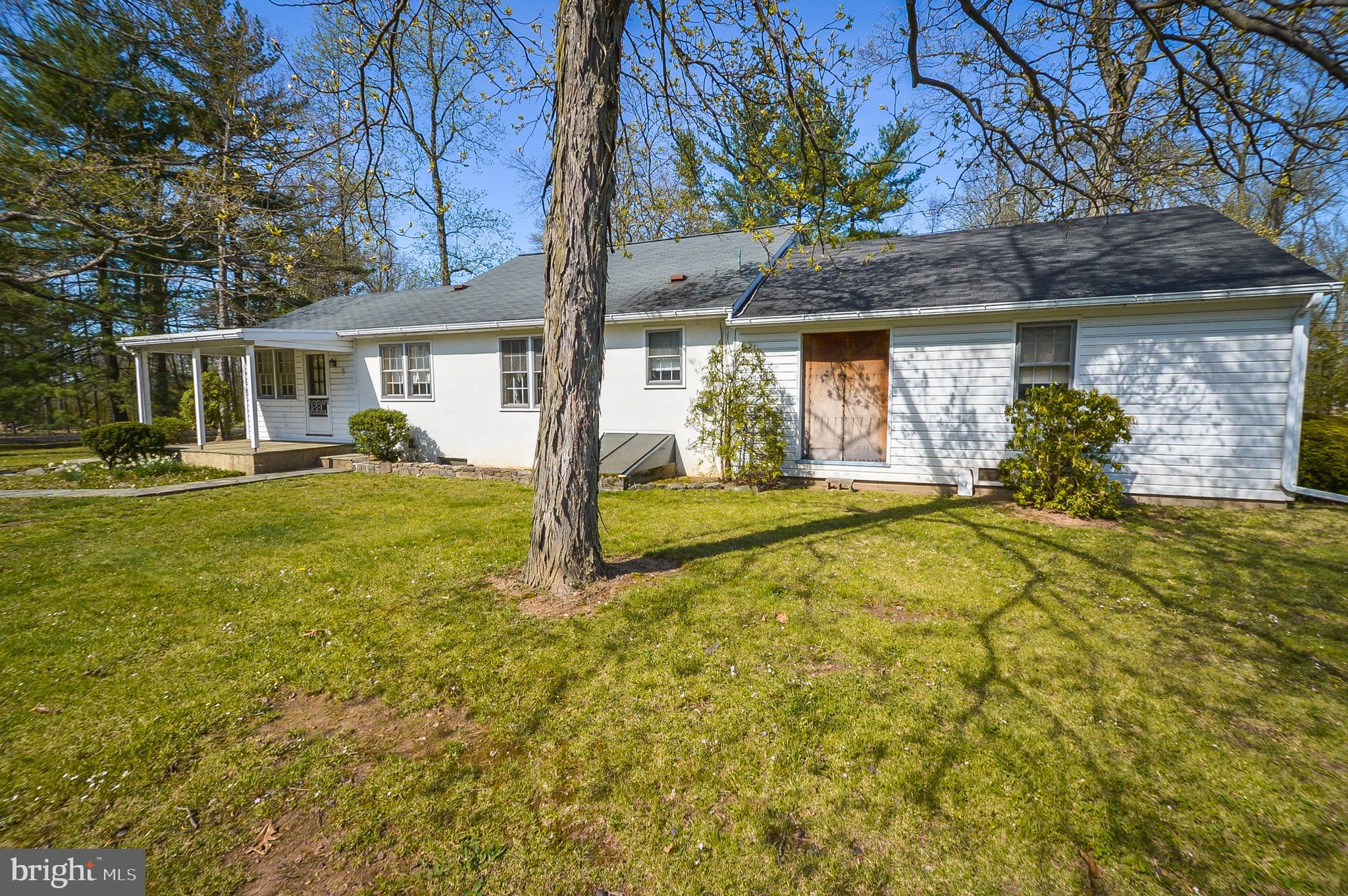 4846 Toll Gate Road New Hope, PA 18938 - Photo 3 of 28 a front view of a house with a yard