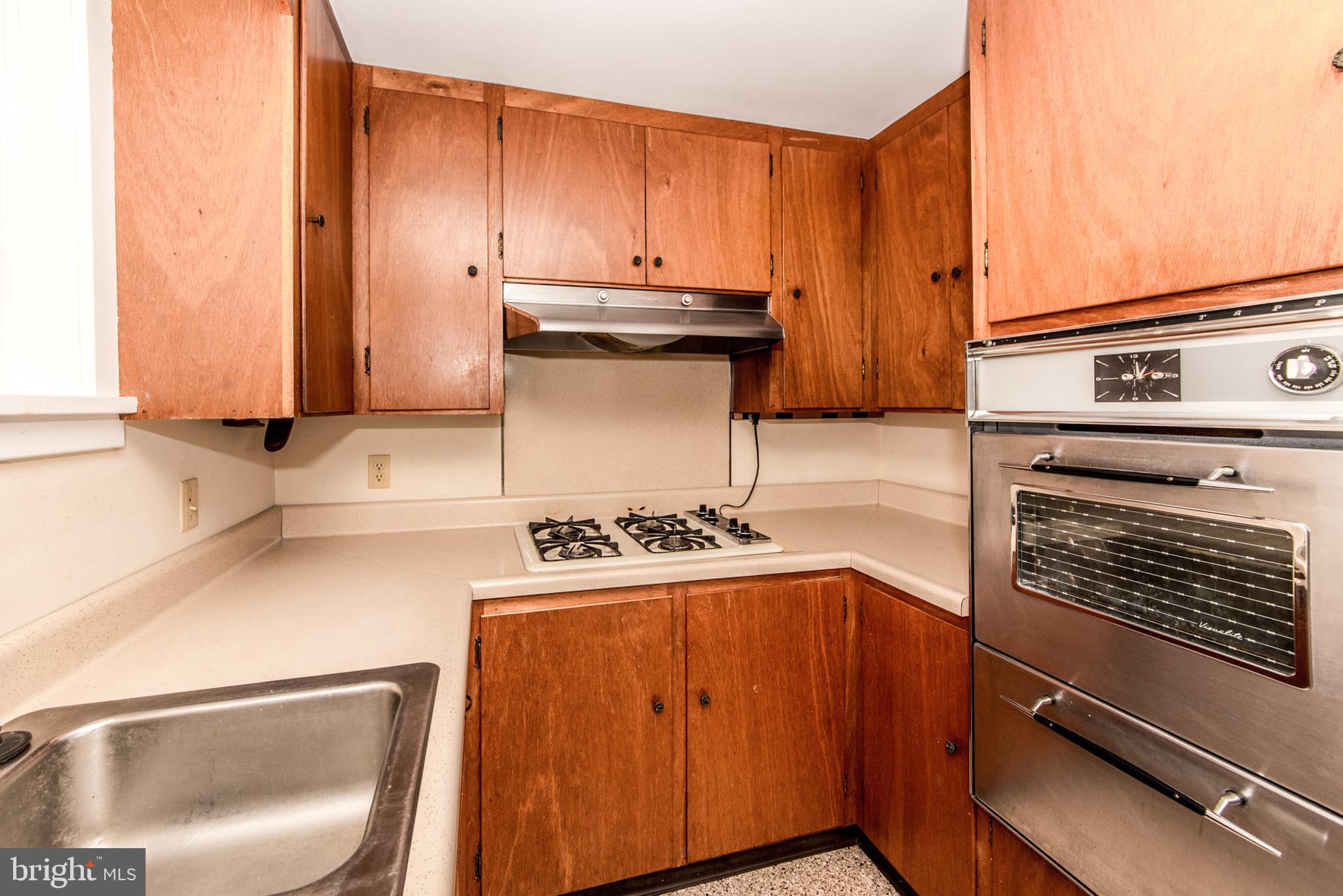 4846 Toll Gate Road New Hope, PA 18938 - Photo 8 of 28 a kitchen with a stove and a microwave