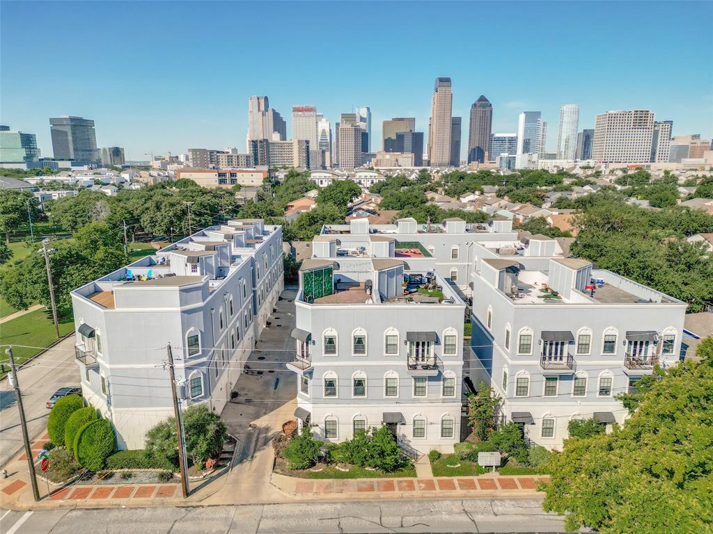 a view of a city with tall buildings