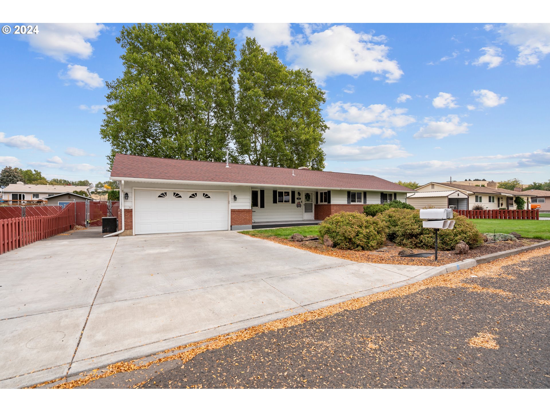 1338 Southwest 41st Street Pendleton, OR 97801 - Photo 1 of 40 a view of multiple houses with a street