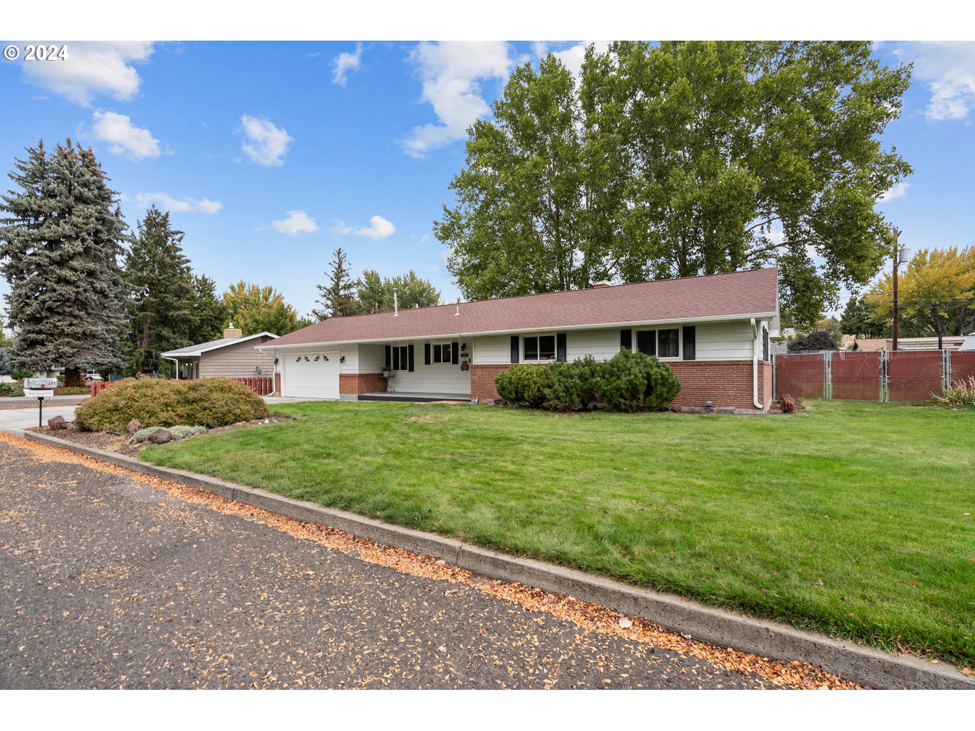 1338 Southwest 41st Street Pendleton, OR 97801 - Photo 3 of 40 a front view of a house with a yard
