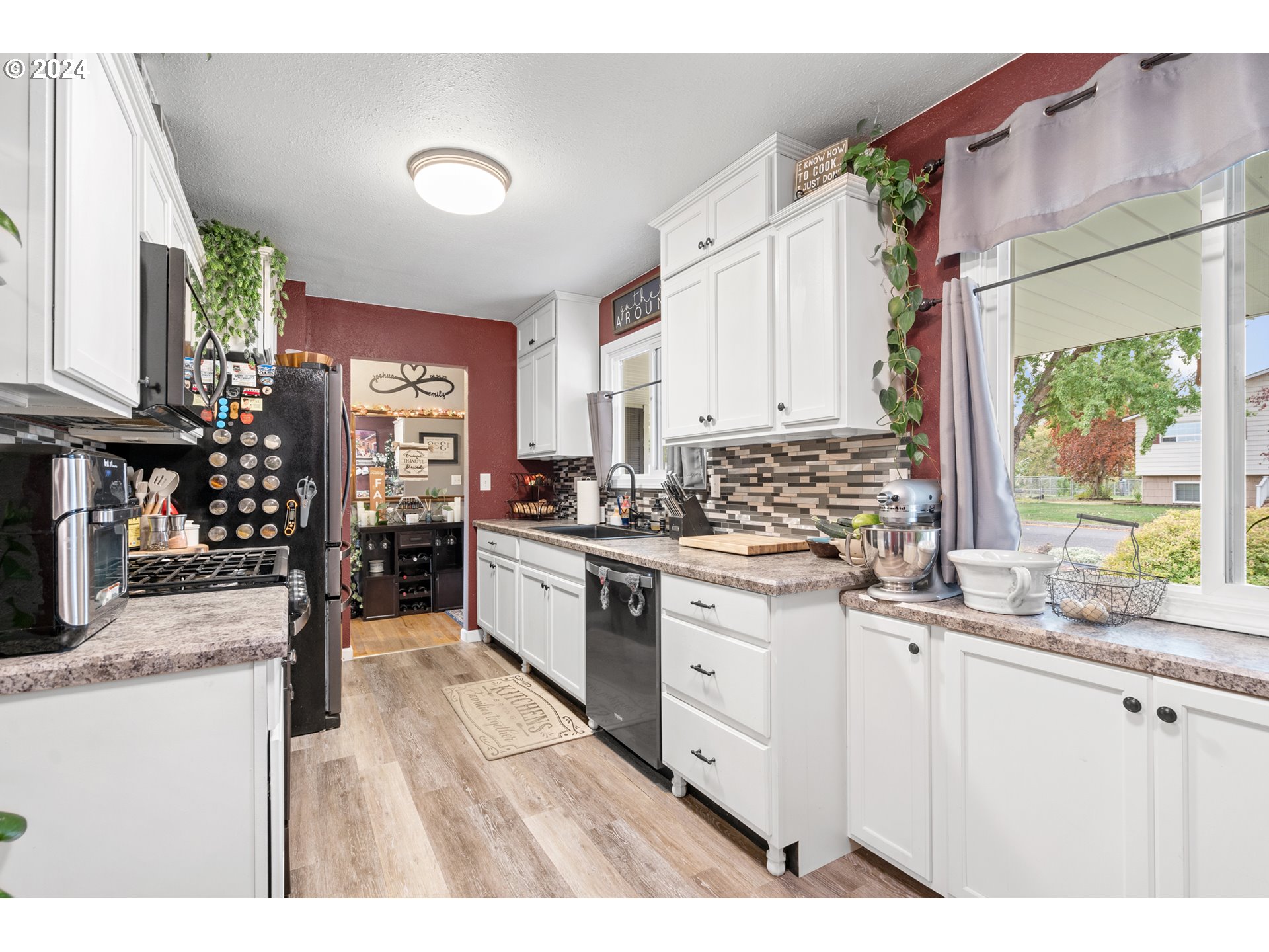 1338 Southwest 41st Street Pendleton, OR 97801 - Photo 6 of 40 a kitchen with counter top space a sink and cabinets