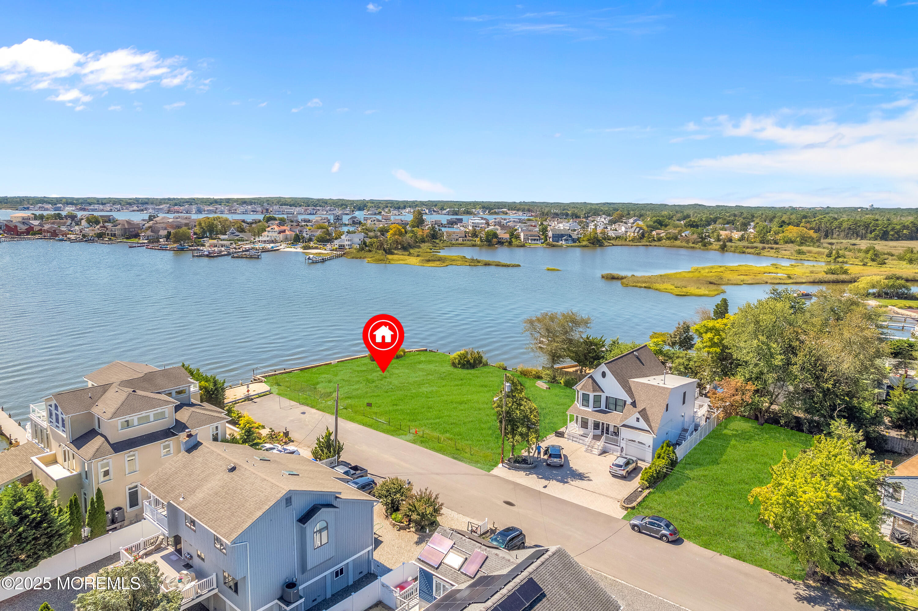 2 Cedar Tree Lane Toms River, NJ 08753 - Photo 6 of 37 an aerial view of a house with a garden and lake view
