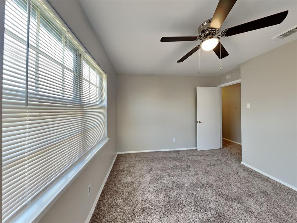 647 Rutgers Drive Lancaster, TX 75134 - Photo 16 of 23 a view of an empty room with a window