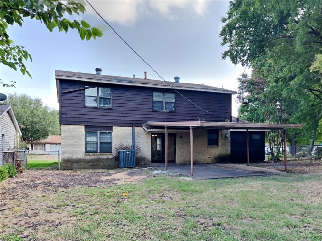 647 Rutgers Drive Lancaster, TX 75134 - Photo 21 of 23 a view of a house with a yard and plants