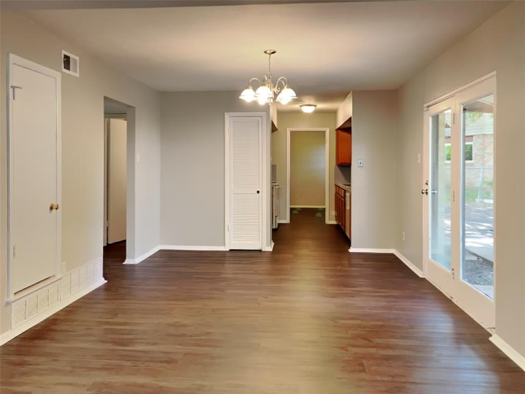 647 Rutgers Drive Lancaster, TX 75134 - Photo 4 of 23 a view of a livingroom with a chandelier