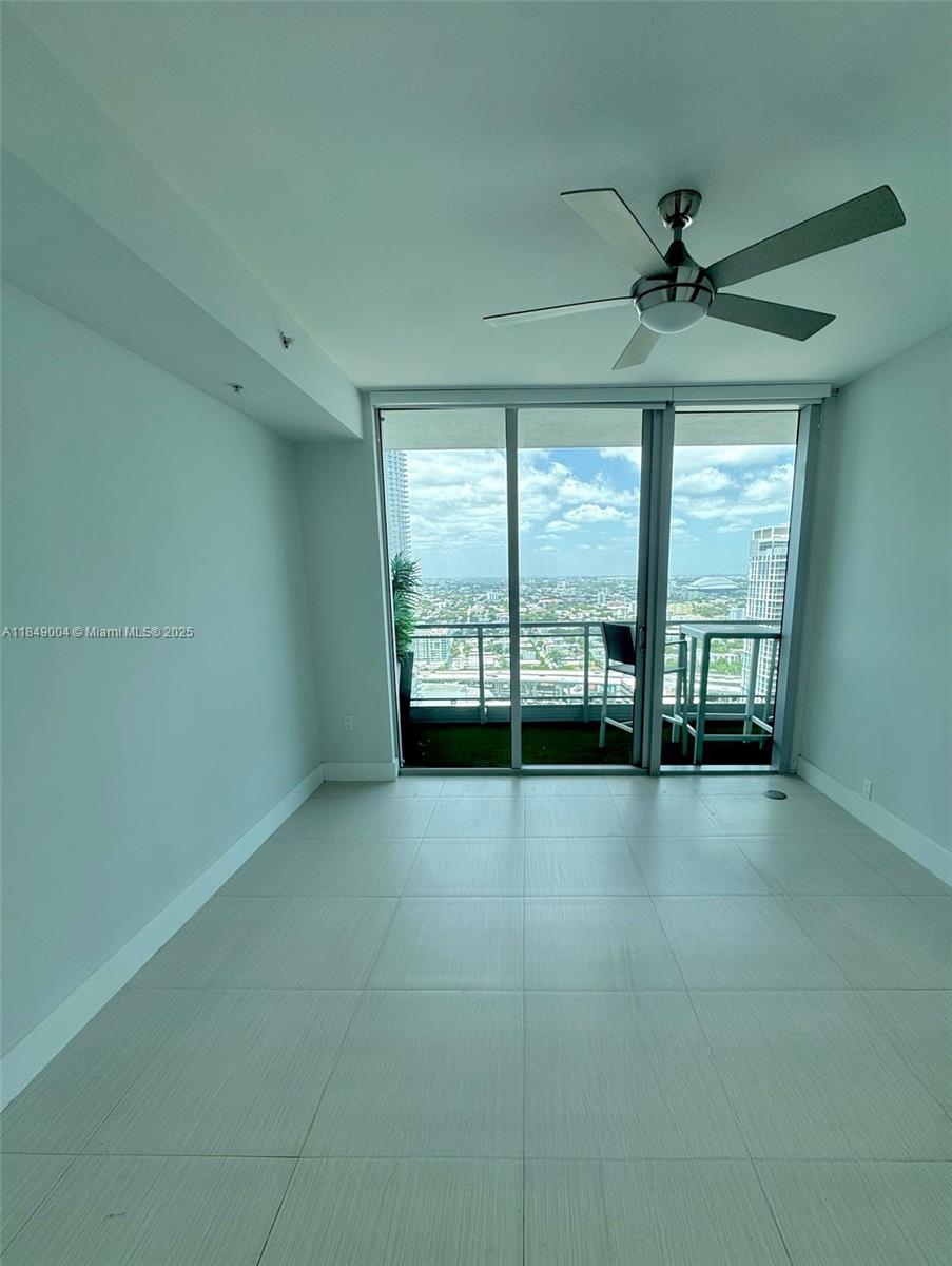 92 Southwest 3rd Street, Unit 3608 Miami, FL 33130 - Photo 11 of 24 a view of an empty room with a window