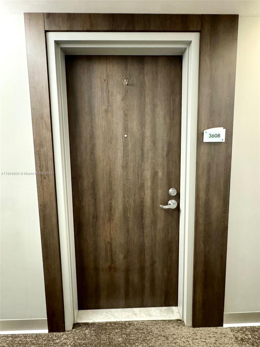92 Southwest 3rd Street, Unit 3608 Miami, FL 33130 - Photo 3 of 24 a view of a wooden door