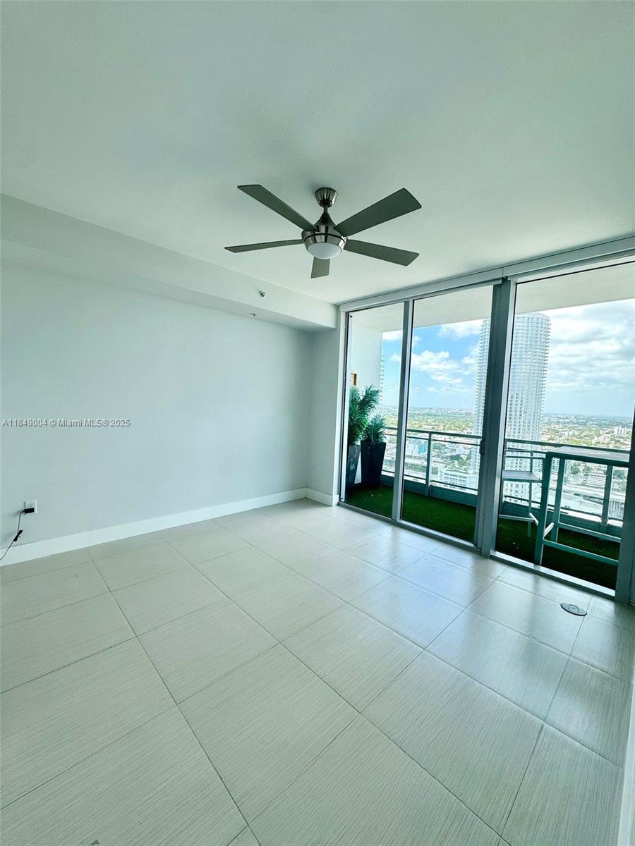 92 Southwest 3rd Street, Unit 3608 Miami, FL 33130 - Photo 9 of 24 a view of an empty room with a window