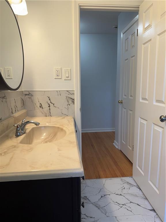1309 Weston Drive Decatur, GA 30032 - Photo 17 of 35 a bathroom with a sink and a mirror