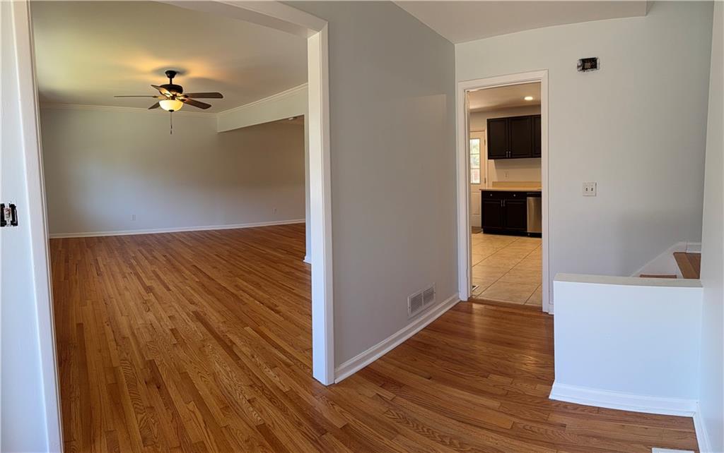 1309 Weston Drive Decatur, GA 30032 - Photo 26 of 35 wooden floor in an empty room with a gallery