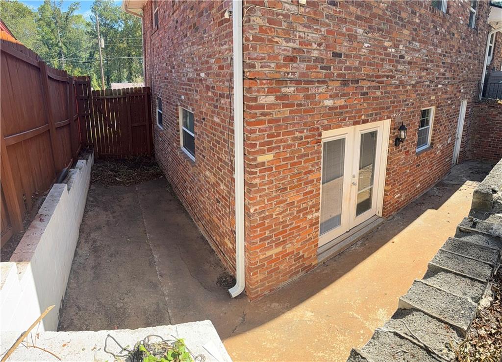1309 Weston Drive Decatur, GA 30032 - Photo 5 of 35 a view of a brick wall of the building
