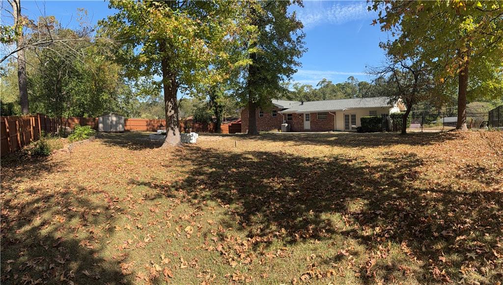 1309 Weston Drive Decatur, GA 30032 - Photo 7 of 35 a view of a backyard with large trees