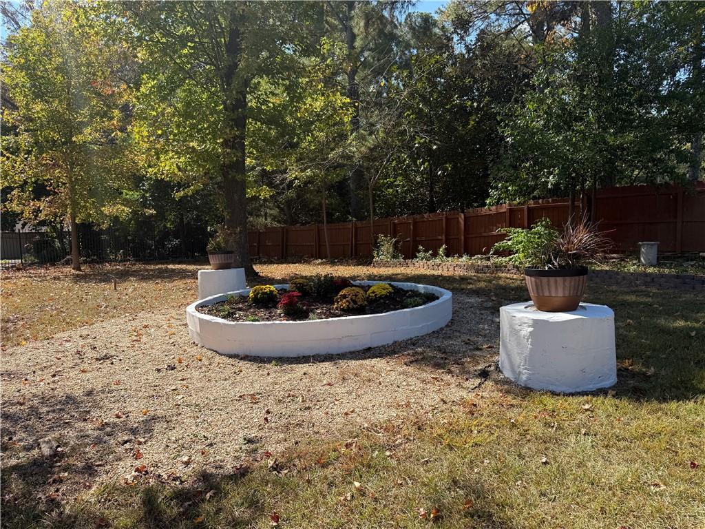 1309 Weston Drive Decatur, GA 30032 - Photo 9 of 35 a view of a backyard with swimming pool and furniture