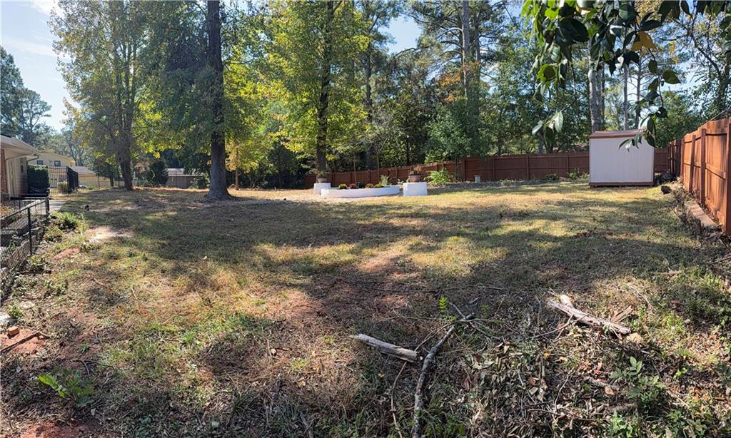 1309 Weston Drive Decatur, GA 30032 - Photo 10 of 35 a view of a yard with large trees