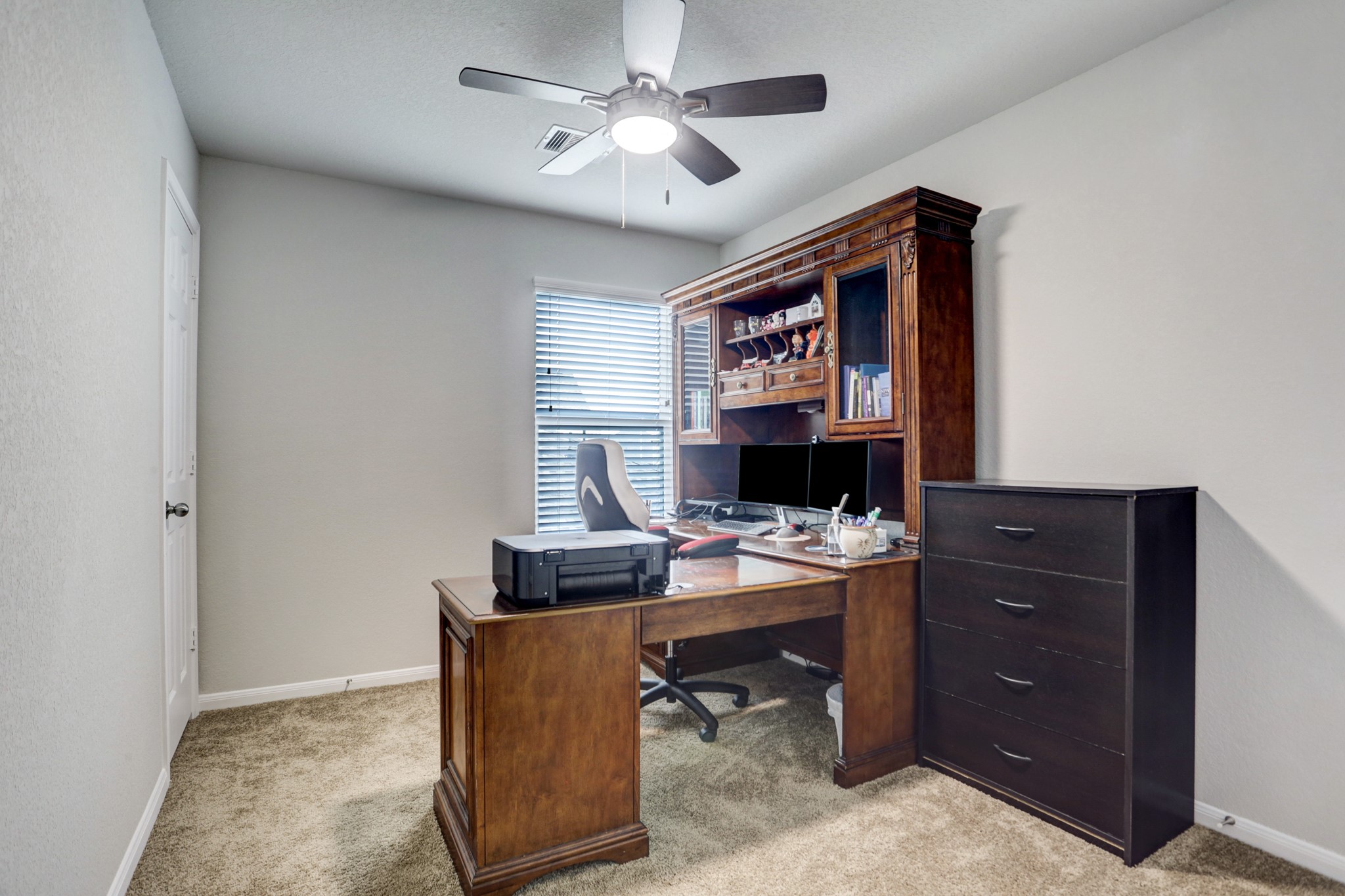 5414 Rustic Ruby Drive Fulshear, TX 77423 - Photo 7 of 18 a view of a workspace with furniture