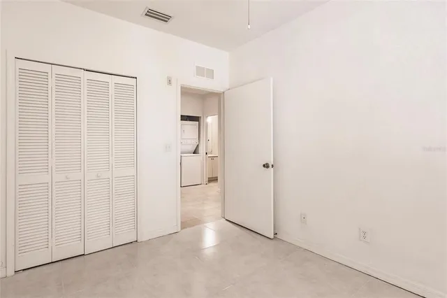 an empty room with closet
