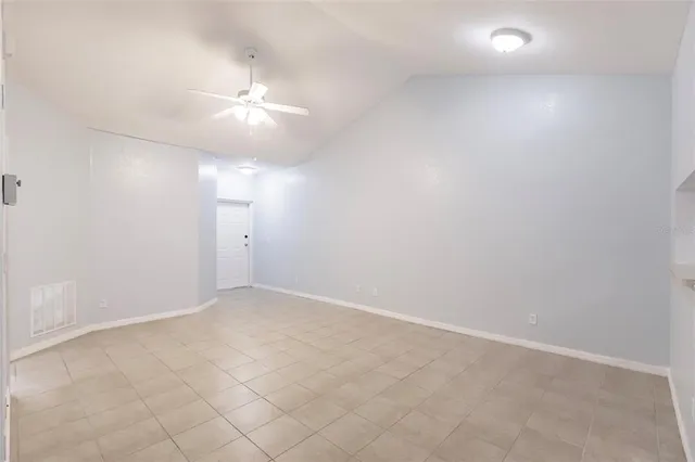 a kitchen with a stove sink and refrigerator