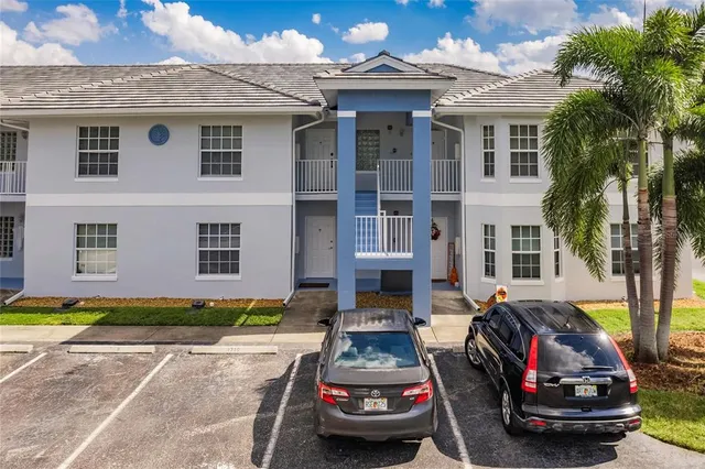 a view of a car parked in front of a house
