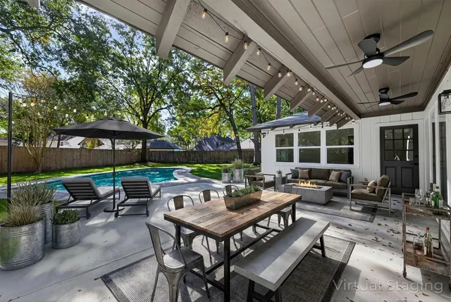 a view of a house with a big yard