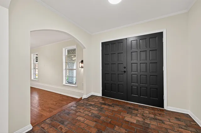 an empty room with windows