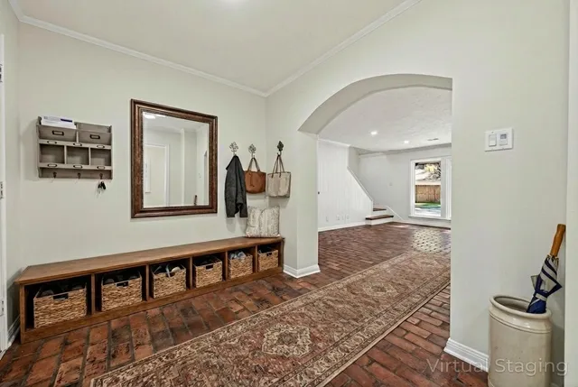 a view of a room with wooden floor and window