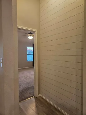 a view of livingroom with wooden floor