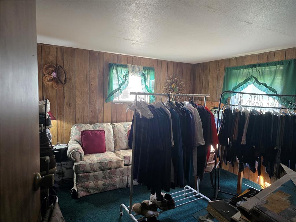 513 Smith Road Polk City, FL 33868 - Photo 11 of 33 a bedroom with furniture and a window