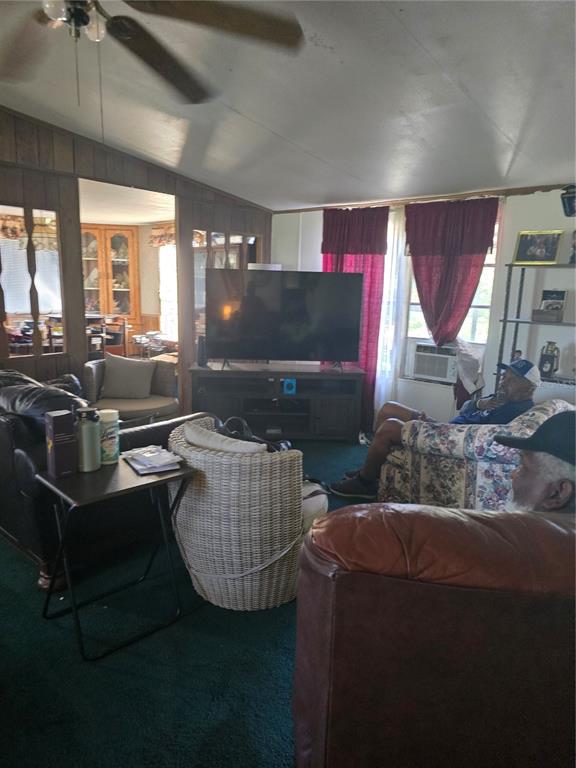 513 Smith Road Polk City, FL 33868 - Photo 19 of 33 a living room with furniture and a fireplace