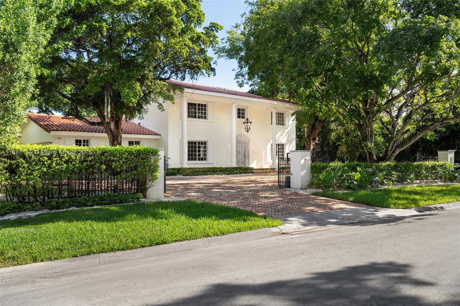 575 Bay Point Road Miami, FL 33137 - Photo 20 of 87 a view of a yard in front view of a house