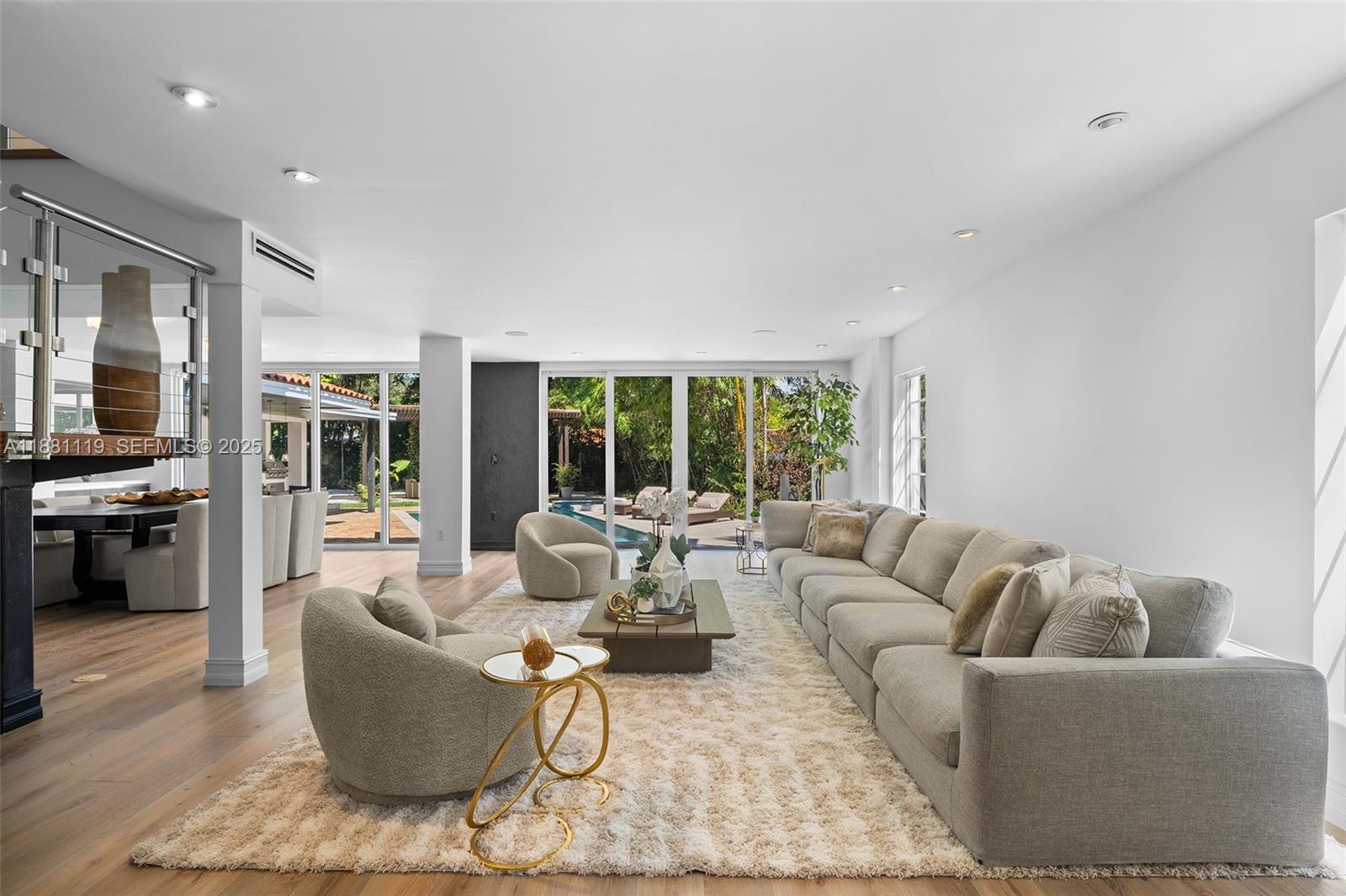 575 Bay Point Road Miami, FL 33137 - Photo 26 of 87 a living room with furniture and a large window