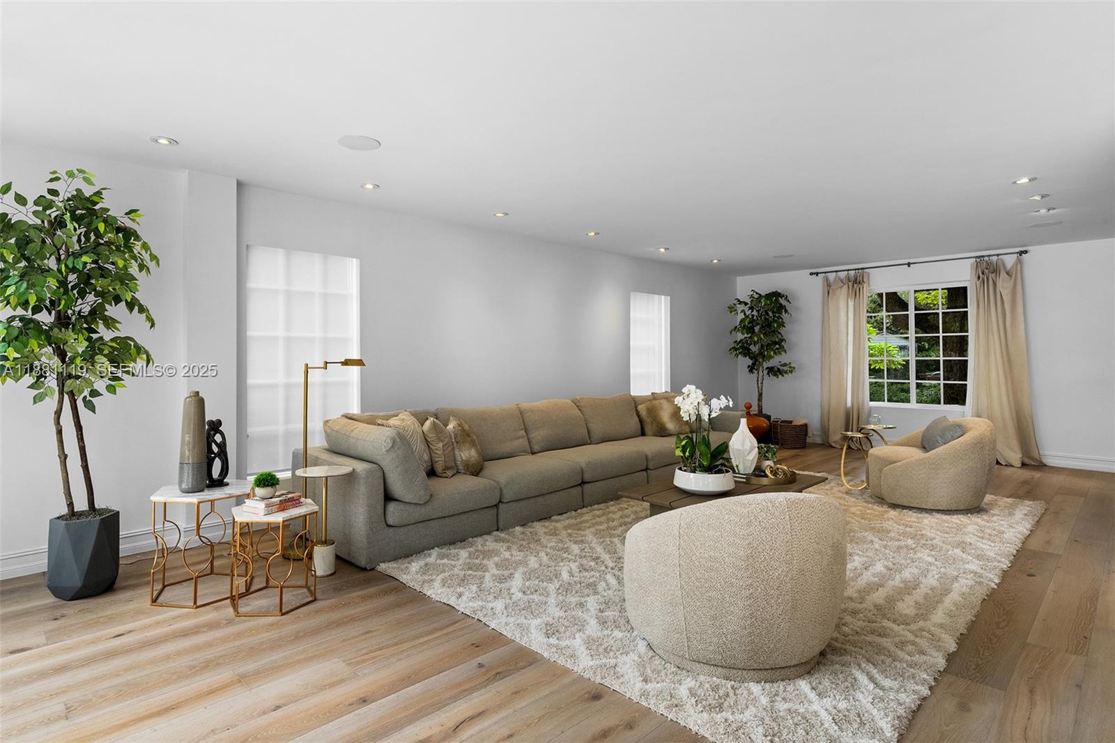 575 Bay Point Road Miami, FL 33137 - Photo 27 of 87 a living room with furniture potted plant and a window
